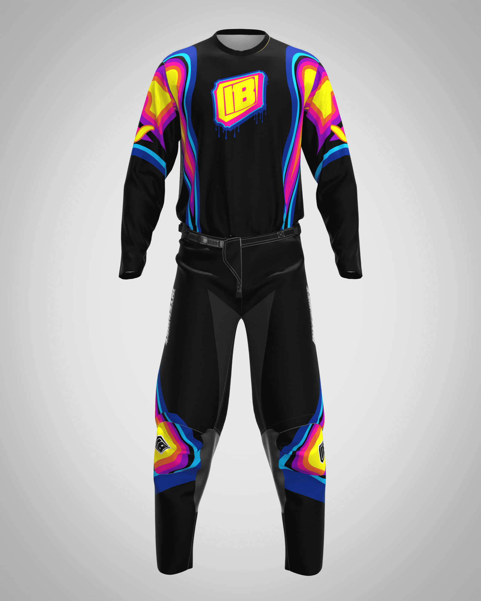 Tenue de motocross TROPICAL INTERBIKE, design coloré jaune, rose et bleu, résistante et personnalisable pour les pilotes exigeants.